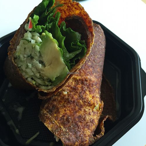 raw wrap with zoodles, cashew sour cream, avocado in spicy pumpkin wrap  at Zest for Life in Amsterdam