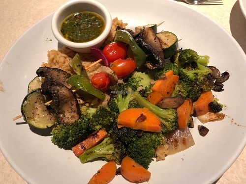 Veggie Kabobs over rice with side of roasted veggies! at Zoës Kitchen in Bluffton