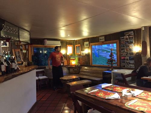 cozy interior with ~10 tables at La Senyera in El Chalten