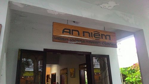 Entrance sign with different name, although menu shows "Annen" at Annen Vegetarian & Yoga in Hoi An