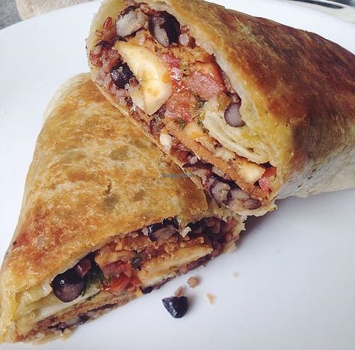 cuban burrito, red rice, black beans, fried plaintains, spicy seitan, chimichurri and pico de gallo at Green Bar in Makati