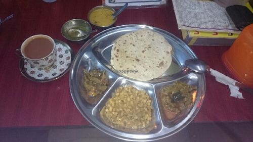 Heard pestle and mortar smashing spices for fresh masala chai. Ask for soy milk  at Nepali & Indian Only Vegetarian in Yangon