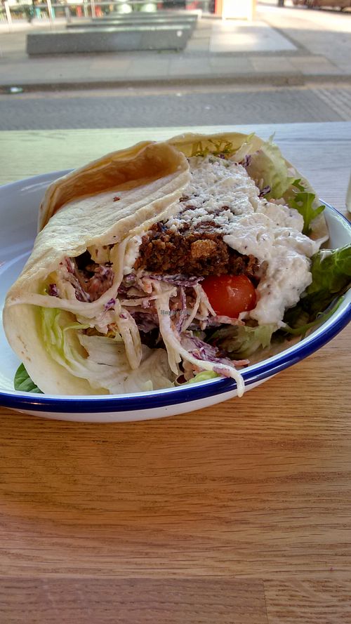 Vegan haggis burger wrap, huge! at Henderson's - Holyrood in Edinburgh