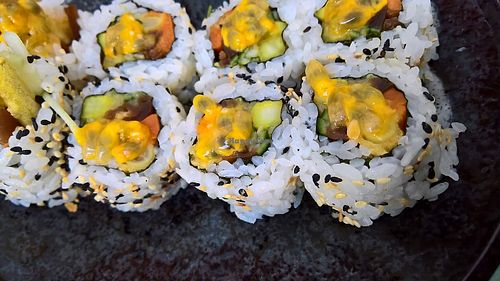 Veggies toped with passion fruit at Youmiko Vegan Sushi - Hoża in Warsaw