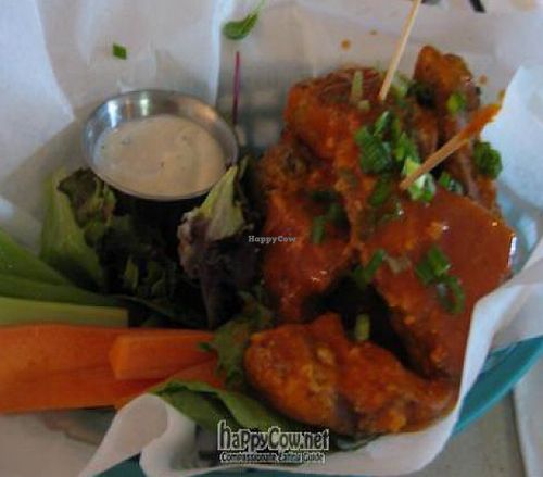 Spicy Cheeky Wings (Sorry for the poor photo quality, I didn't want to use a flash and I wasn't near the door or window) at Sluggo's in Pensacola
