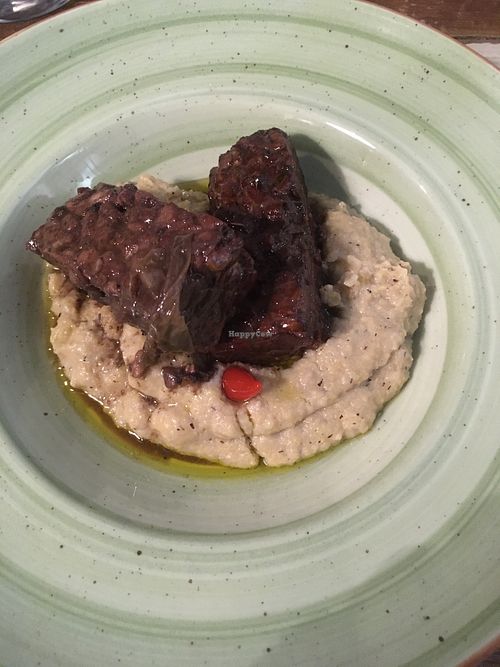 Wine roast tempeh and polenta  at L'Orto Gia Salsamentario in Turin