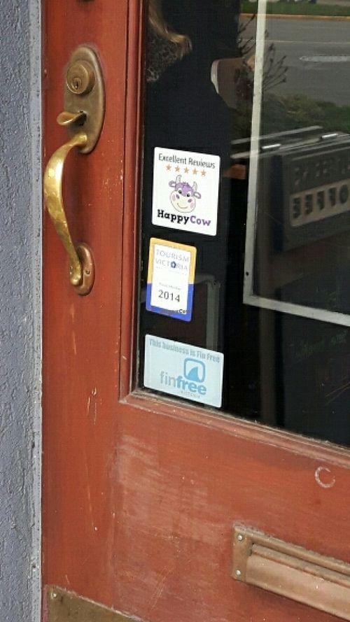 Happy Cow decal on door  at The Hot & Cold Cafe  in Victoria