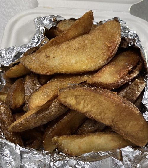 Overcooked potato wedges   at Reverie Cafe + Bar in Minneapolis