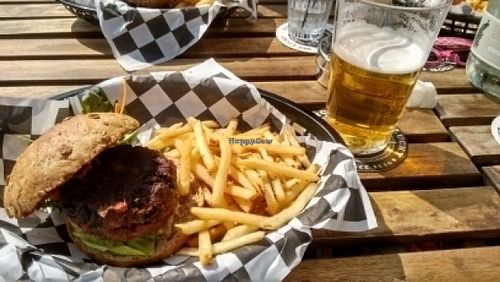 black bean & seitan burger with fries. pint of black isle blonde at Lucky Pig - Paradise Palms in Edinburgh