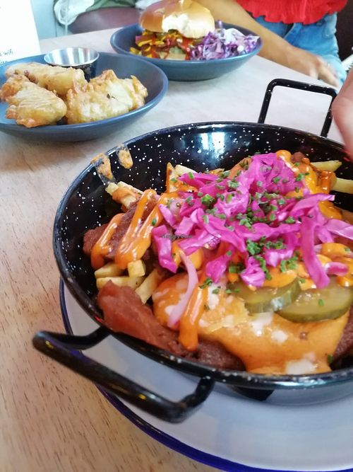 Dirty Fries, Burger and Deep fried pickle at Antojitos Cantina - Paradise Palms in Edinburgh