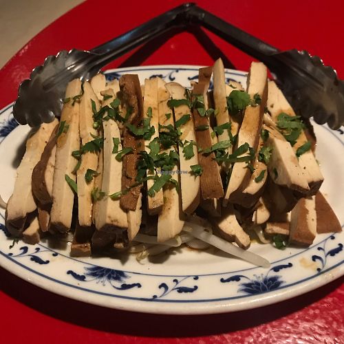 Pressed baked tofu small plate at Single Pebble in Burlington