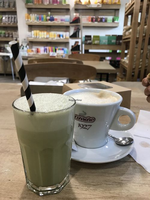 Matcha latte with herbal cappuccino and almond milk  at BIOrganic Raw Cafe in Chisinau