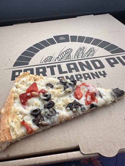 Well done. Black olive, red pepper mushroom in garlic olive oil perfect   at Portland Pie Company in Brunswick