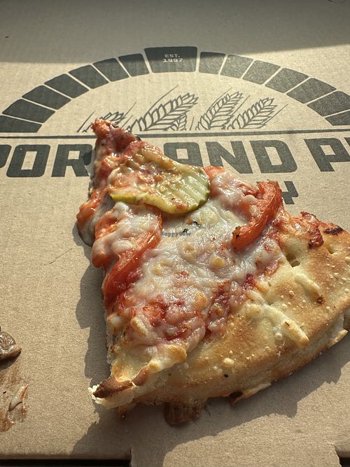 Red sauce, requested BBQ didn’t get it, pickles, tomato + mushroom. Under cooked at the center    at Portland Pie Company in Brunswick