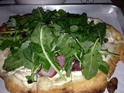 almond cream potato caper shiitake anchovy oregano baby kale pizza at Double Zero in New York City
