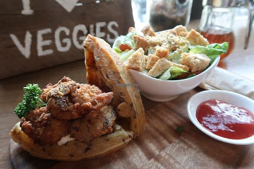 Waffles with vegan chicken and small ceasar salad (kinda disappointing. The waffles are sweet and then with the mayo and 'chicken'.. weird. I had better vegan chicken. The salad is boring) at Veganerie Concept - Benjasiri Park in Bangkok