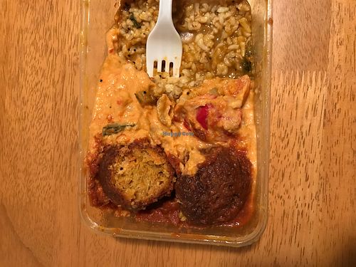 So good, all vegan three different curries with brown rice on bottom at Bamboo Flute in Coolangatta