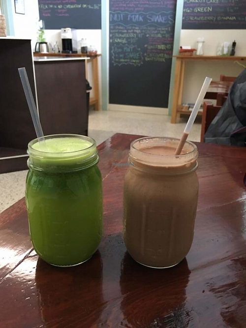 "Green Heart" all organic, made to order, cold pressed juice (celery, apple, parsley, ginger) & raw cacao/peanut butter nut mylk shake... yummm at Old Earth Pure Organic Food in St Petersburg