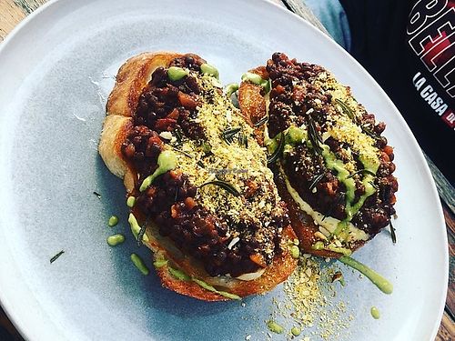 Savoury lentils, sourdough bruchetta, cashew creme, nut parmesan, fermented herbs.  at Ground Earth in Woolgoolga