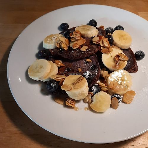 Blueberry pancakes with banana and almonds at Cafe Van Gogh in South West London