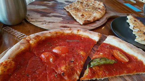Pizza and Garlic Pizza at Arcobaleno on the Beach in Gympie