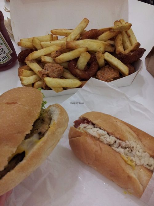 Chick'n burger (bottom left), Melbourne hot dog (bottom right) and The Lot Munch Box (back) at Lord of the Fries in Northbridge