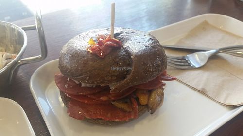 Vegan pizza bagel. (Pepperoni, mozzarella, mushrooms, onion chutney) on a rye bagel. Out of this world! at Flux Valley in Fortitude Valley