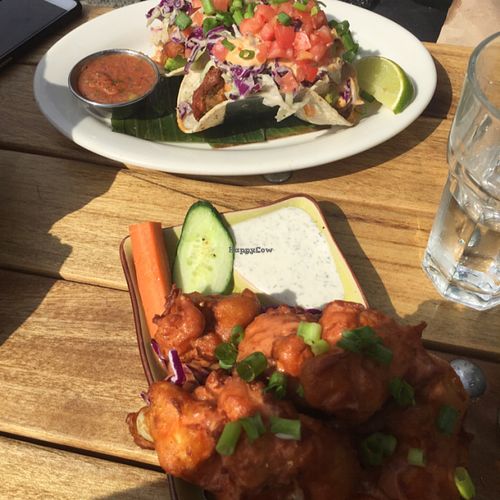 buffalo cauliflower wings and the fried avocado tacos. yum! at No Bones Beach Club in Seattle