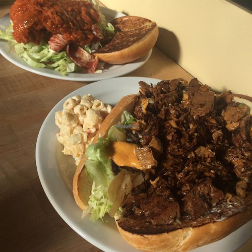 steak & cheese sandwich, buffalo bacon fried chicken sandwich at The Butcher's Son in Berkeley