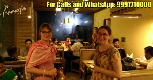 International waitresses welcome you with pleasure! at Ammaji's Ayurvedic Restaurant in Vrindavan
