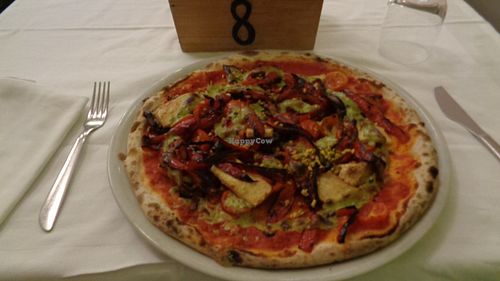 A pizza, probably la pistacchio (pistachio nut). at Pizzeria La Pecora Nera in Syracusa