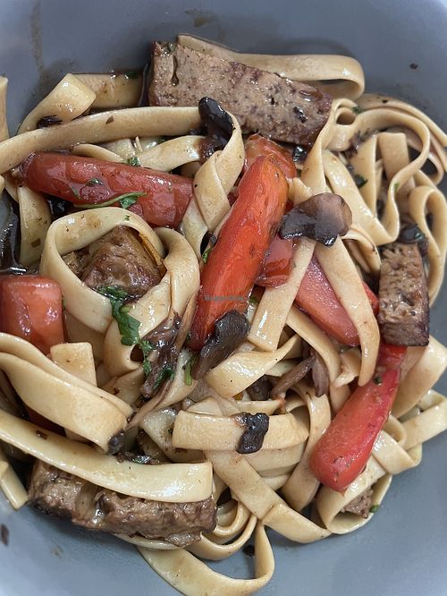 Fettuccine with seitan, mushrooms, tomatoes, and soy sauce   at Seitan Urban Bistro in Lima