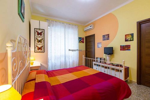 Double bed provided of all the linen and blankets and, if needed, you can host the third person in the same room in an extra single bed.  at Casa Veggy in Rome