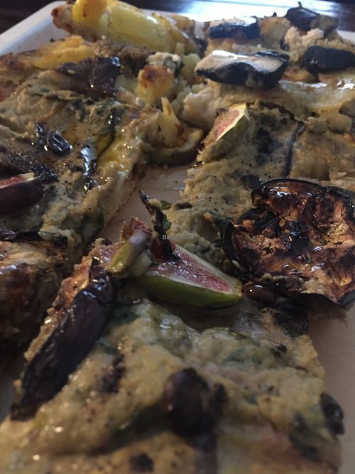 Pizza with aubergine and figs and pizza with potatoes, seitan and aged cashew cheese at MADENITALY in Copenhagen