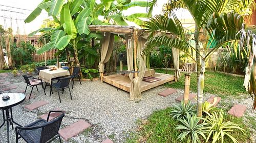 Garden seating  at Pink House Garden in Chiang Mai