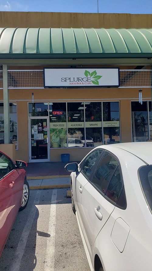 Store front in a strip center behind IHOP at Splurge Juice Bar and Cafe in Hialeah