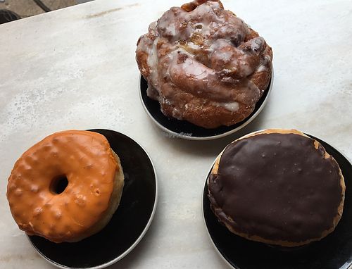 apple fritter, Boston Creme, chai tea  at Dottie's Donuts - Springfield Ave in Philadelphia