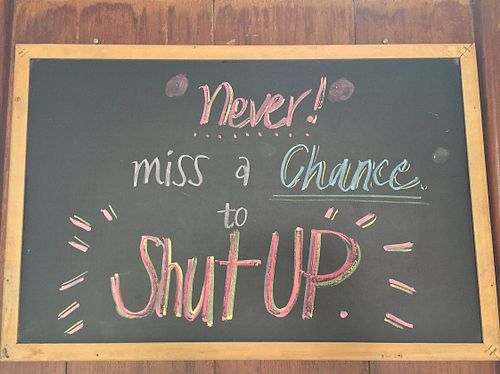 A sign to ";Shut up"; in the cafe. Why so rude? I don't get it.  at Food4Thought in Chiang Mai