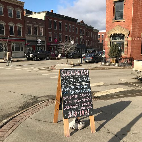 Sidewalk sign at Suecakes in Belfast