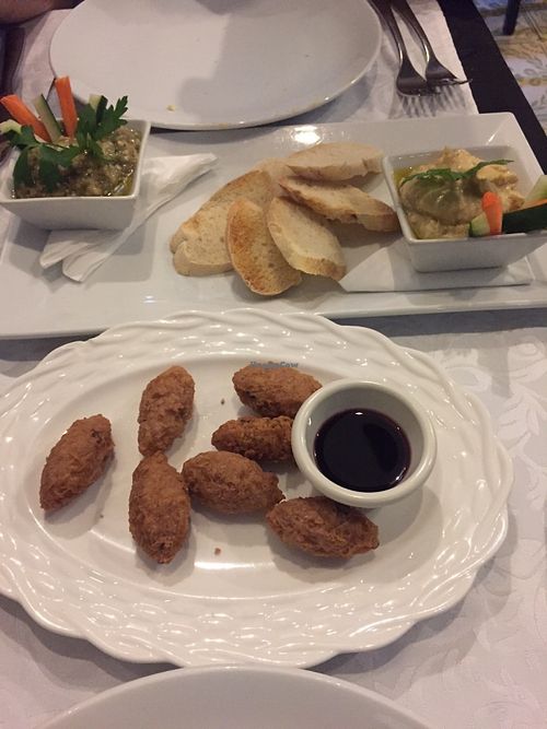 Babaganoush/hummus plate and tarro fritters (all vegan) at Starbien in Havana