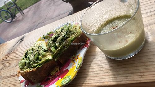 Matcha froth and avocado toast 🤤 at Under the Mango Tree in Miami Beach
