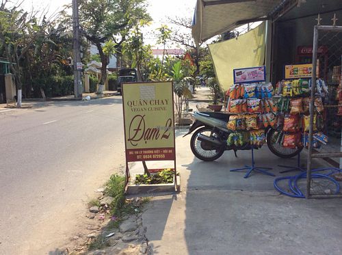 Sign on the street for Dam 2 at Dam 2 in Hoi An