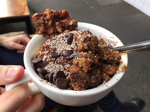 Choc hazlenut and lemon macadamia frozen yoghurt hidden by delicious toppings  at goje in Yarraville