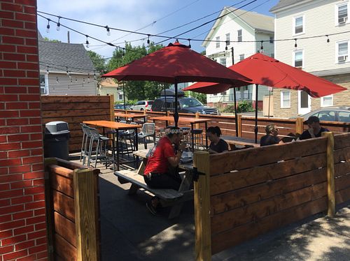 outdoor seating on both sides of building  at Tallulah's Taqueria in Providence