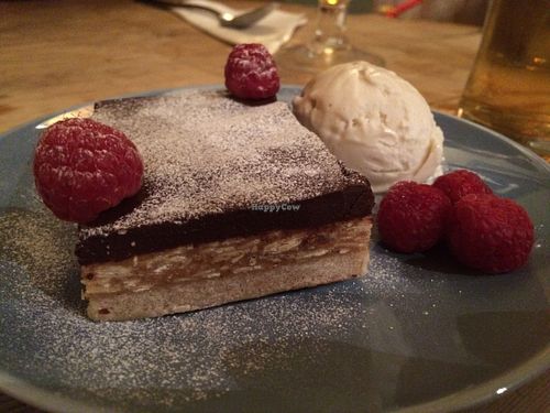 Millionaire shortbread with coconut, almonds served with a side of salted caramel and vanilla ice cream.  Our favorite of the night. at Earth and Stars in Brighton