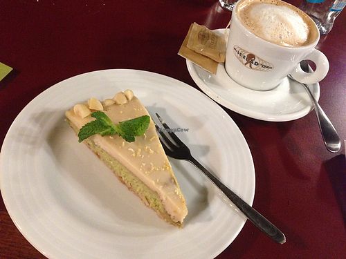 A divine lemon cake and a soy cappucino at Vegan's Prague in Prague