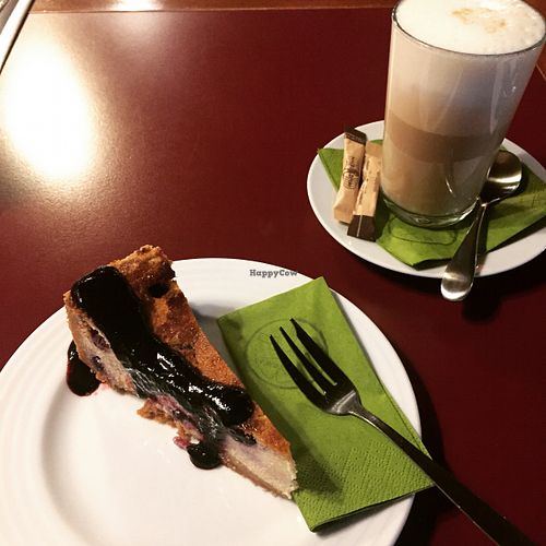 The thinnest slice of cake for far too much money and cold coffee! at Vegan's Prague in Prague