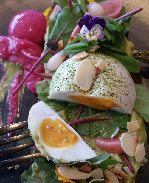 Lime, avo guac toast, almond, beetroot,  radish with poached vegan egg. at Matcha Mylkbar in St Kilda
