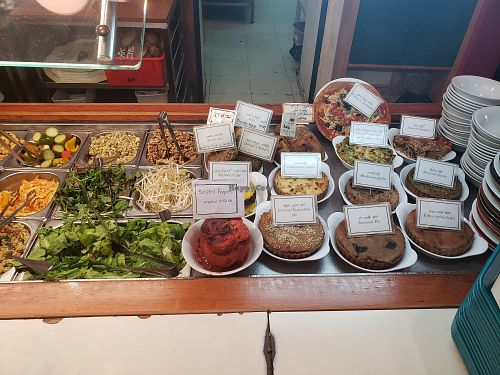 Display of available entrees at Village Green in Jerusalem