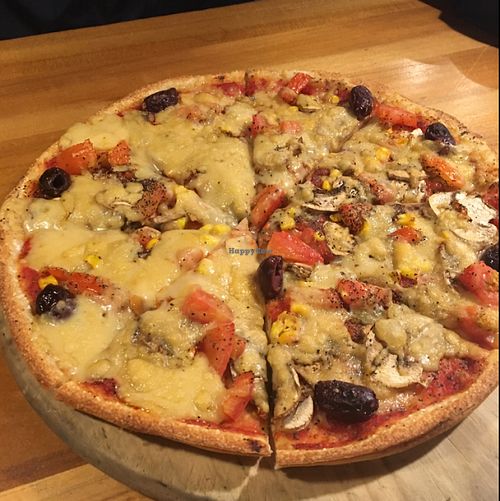 Custom pizza (vegan cheese, mushrooms, olives, etc) at Hell Pizza in Queenstown